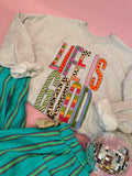 Gray sweatshirt with colorful patchwork “Life Is Good” graphic design for women